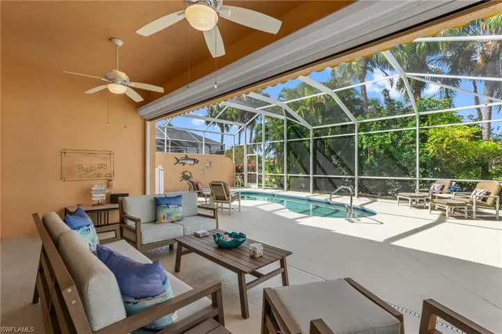 Pool featuring outdoor, covered living space.