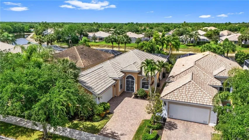 Front of home showing the lush native landscape surrounding the home.