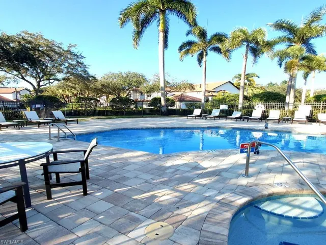 Community pool steps from the front door with plenty of seating and a large hot tub. Also home to a fitness room , large community kitchen, and TV. perfect spot for a football party or family fun day.
