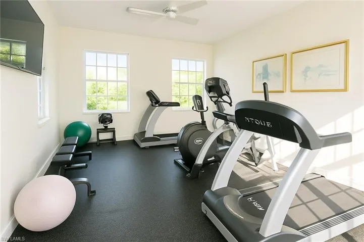 Fitness room with weights and treadmill