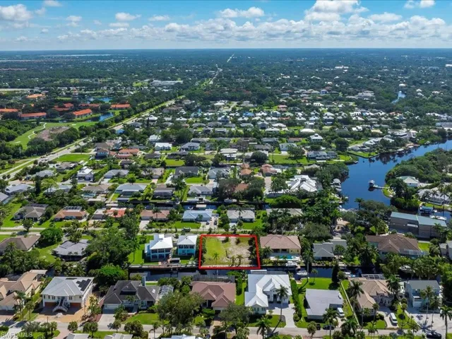 Aerial perspective of suburban area with property boundaries highlighted