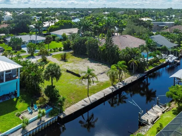 Aerial view of residential area with a large body of water
