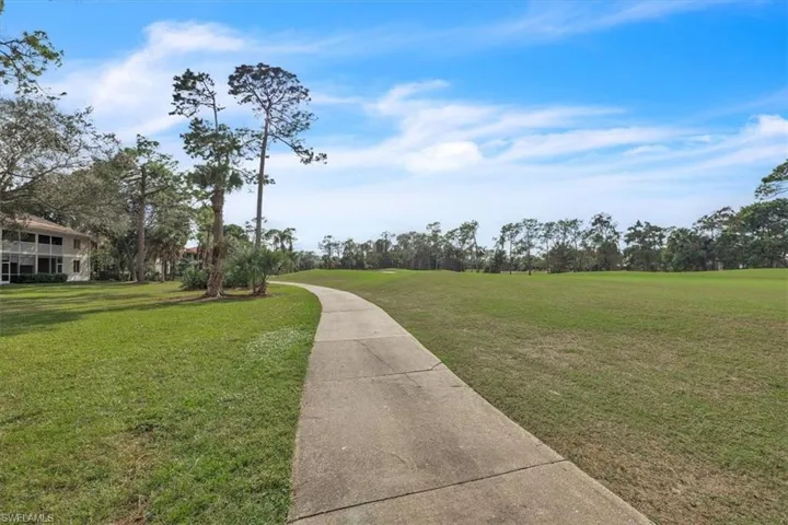 View of home's community featuring a view of golf