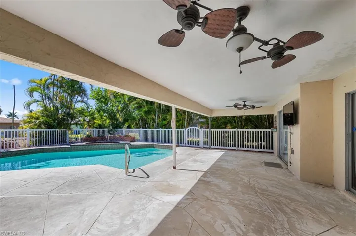 View of swimming pool featuring patio surround