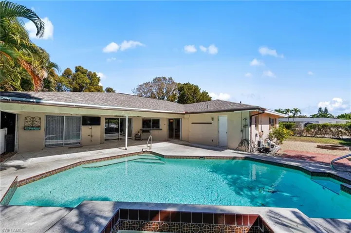 Swimming pool with a patio