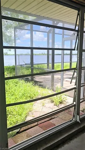 Room details featuring a water view