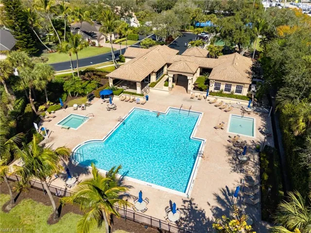Community pool featuring a patio area