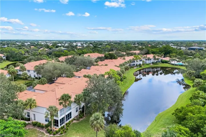Aerial view of residential area with a large body of water