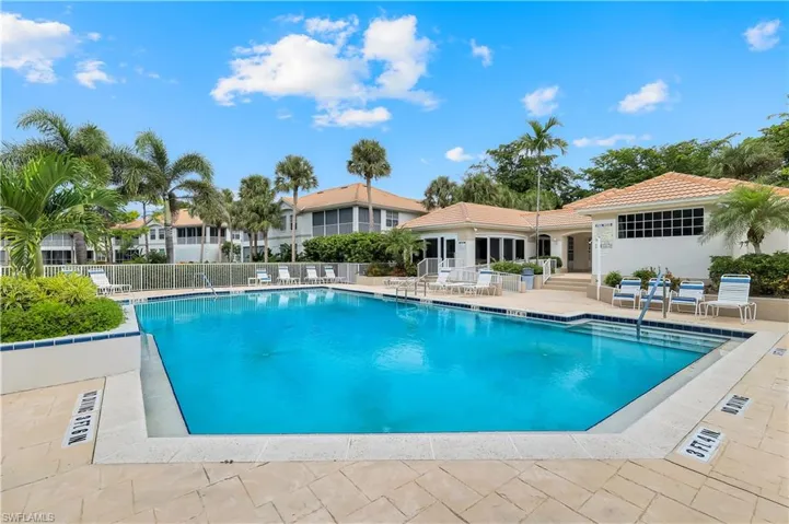 Community pool with a patio area