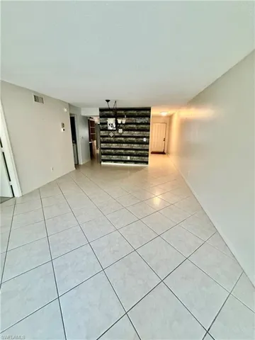 114 Cypress Way E D3, Naples, Florida 34110