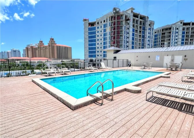 Roof Top Pool and lounge area with restrooms - Ritz Carlton in far left background directly on the beach