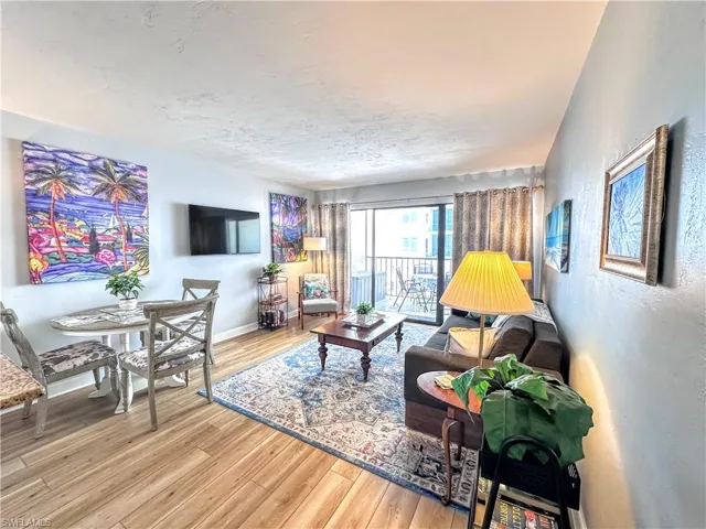 Living area with wood finished floors