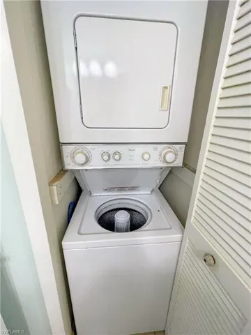 stacked washer/dryer inside unit