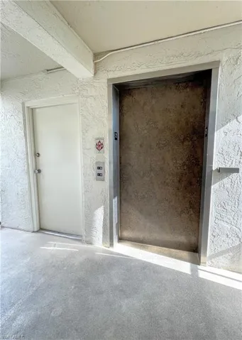 Property entrance with elevator