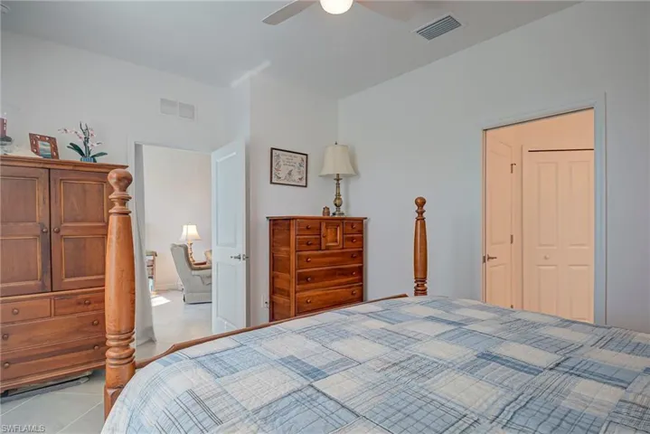 Bedroom featuring ceiling fan and light tile patterned floors