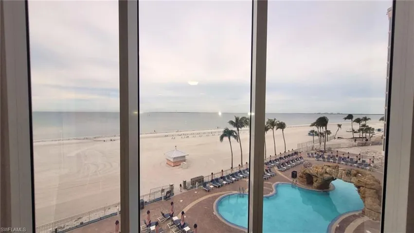 View of swimming pool featuring a water view