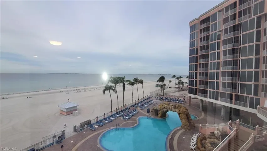 Community pool with a water view