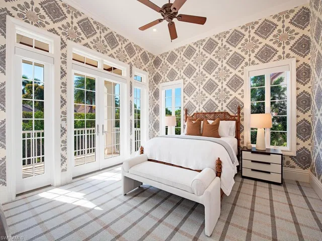 Bedroom with access to outside, ceiling fan, french doors, and ornamental molding
