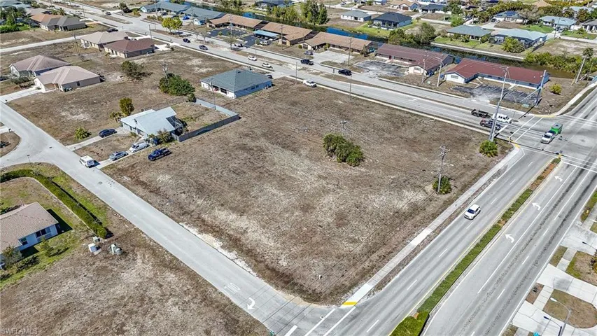 View of property location featuring nearby suburban area