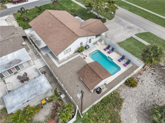 View from above of property featuring a pool area