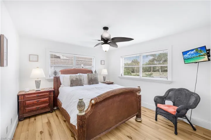 Bedroom featuring light wood-style floors and a ceiling fan