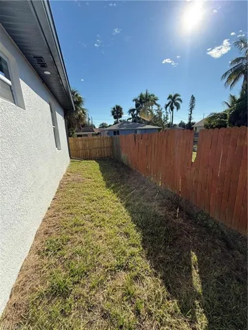 View of fenced backyard