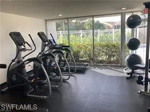 Exercise room featuring expansive windows and plenty of natural light