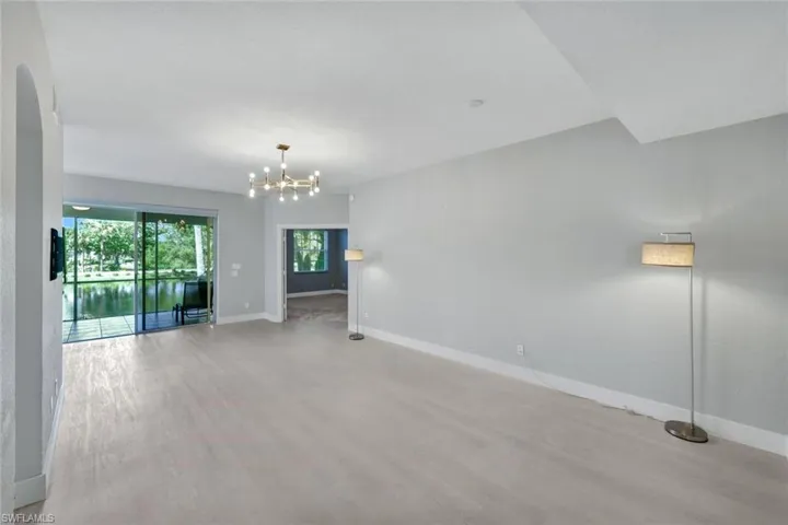 Large open Great Room concept with a chandelier
