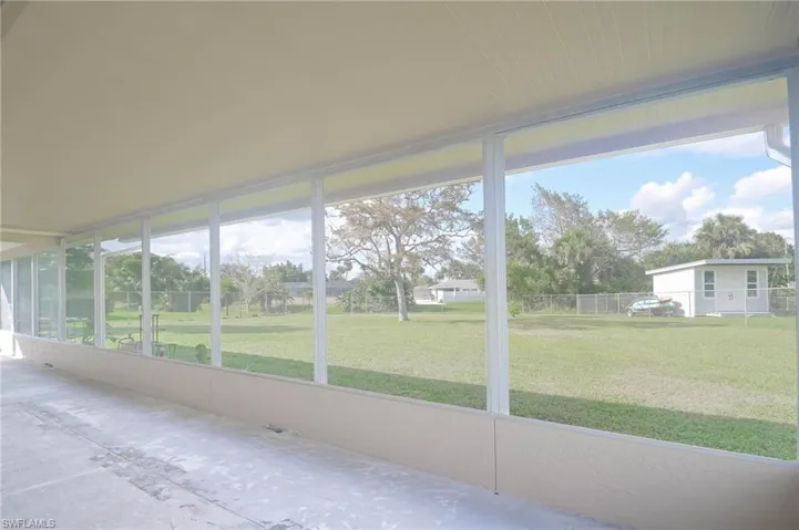 Unfurnished sunroom with a healthy amount of sunlight
