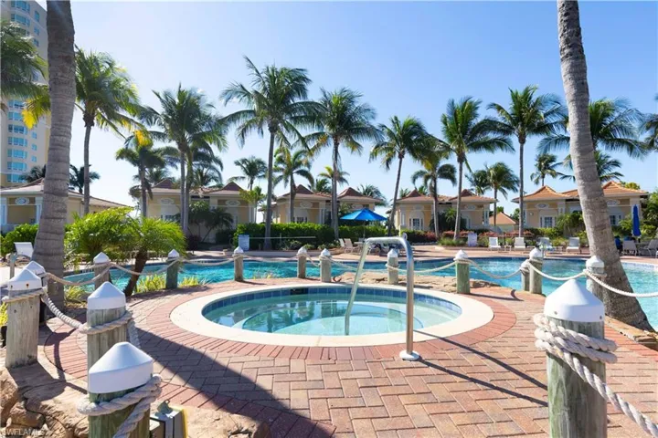 Community pool featuring a community hot tub