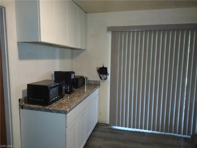 Kitchen with white cabinets