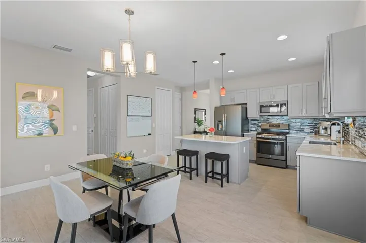 Dining space featuring sink