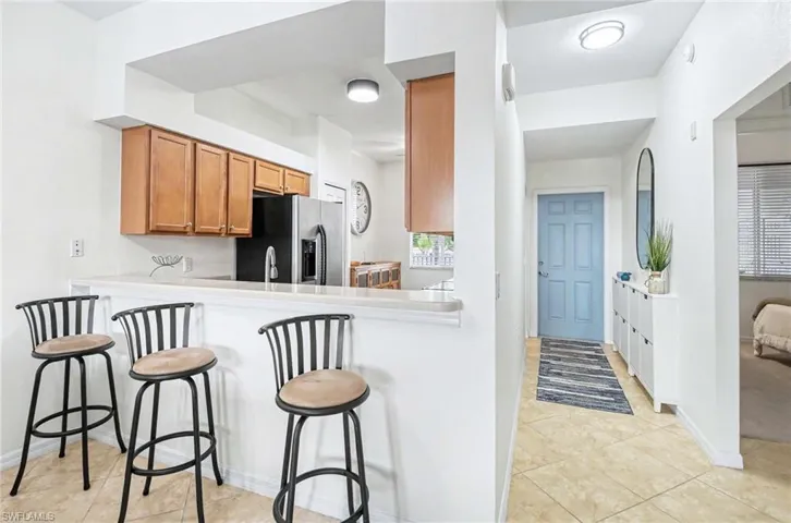 Breakfast Bar between kitchen and living room.