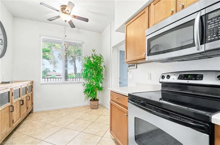 Plenty of space for a breakfast nook or cozy dining area. Lighted ceiling fan.