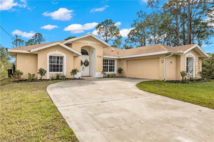 1128 Craft ST E, LEHIGH ACRES FL 33974