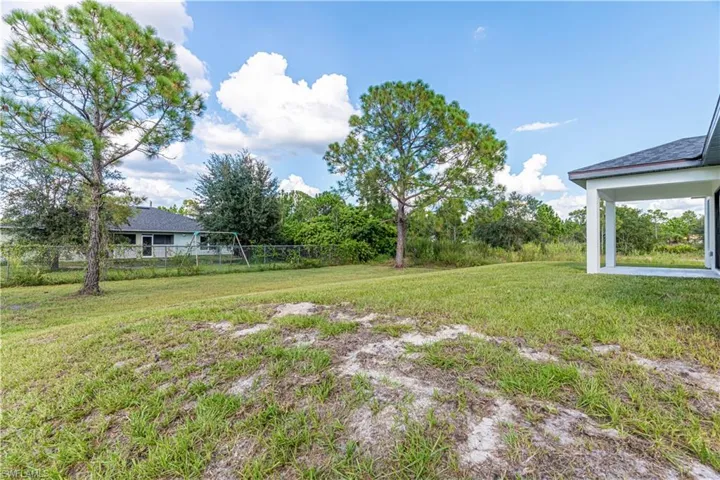 View of yard with view of scattered trees