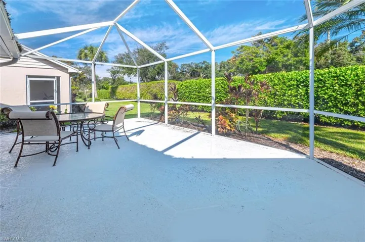 View of patio / terrace with a lanai