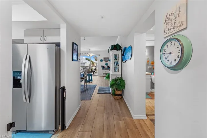 Hall featuring light hardwood / wood-style flooring