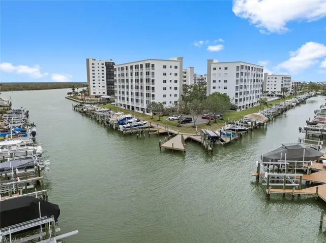 View of water feature with a boat dock