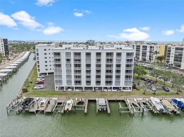 View of building exterior featuring a water view