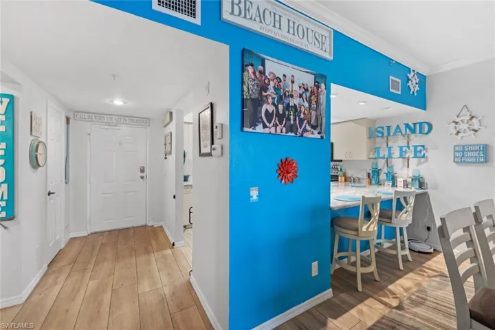 Hall featuring crown molding