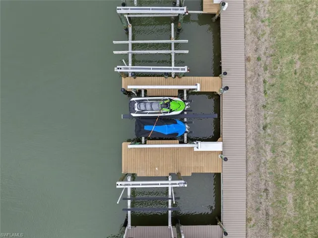 Aerial view featuring a water view