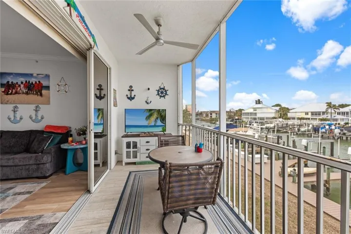 Balcony featuring ceiling fan