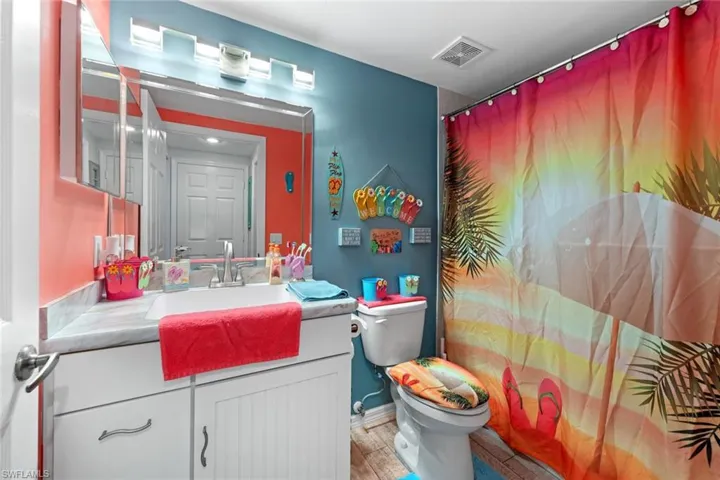 Bathroom featuring toilet and vanity