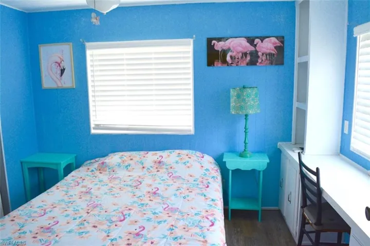 Bright interior space featuring blue wall paneling