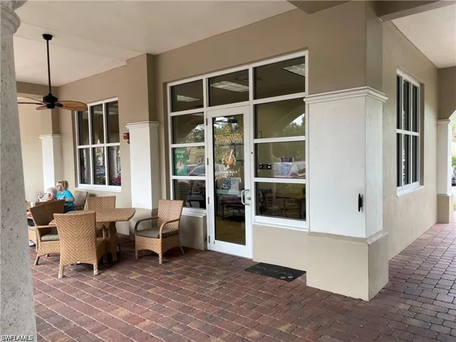 View of patio with ceiling fan