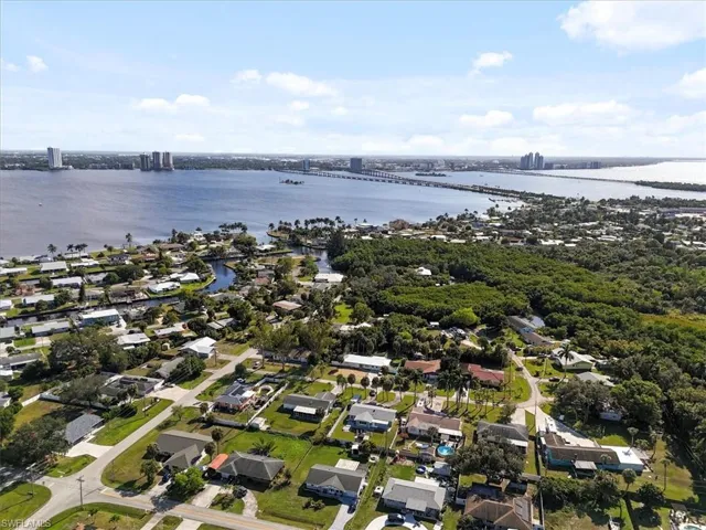 Aerial overview of property's location with a notable bridge and nearby suburban area