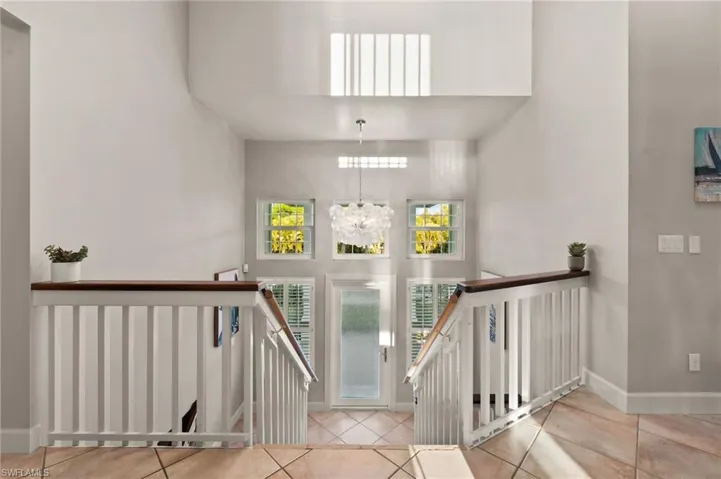 Beautiful Entry with stairs leading to main floor