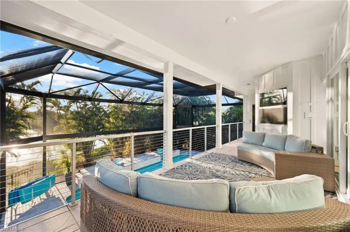 Large balcony overlooking the expansive pool area!!