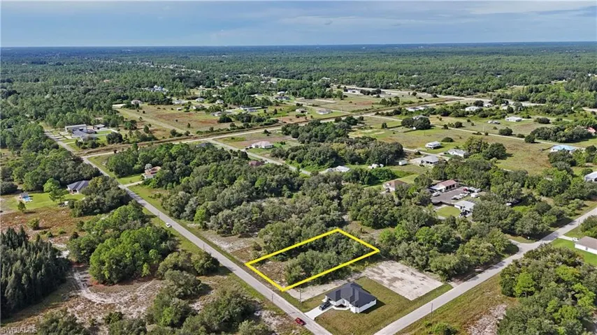 Wooded land parcel with direct road frontage
